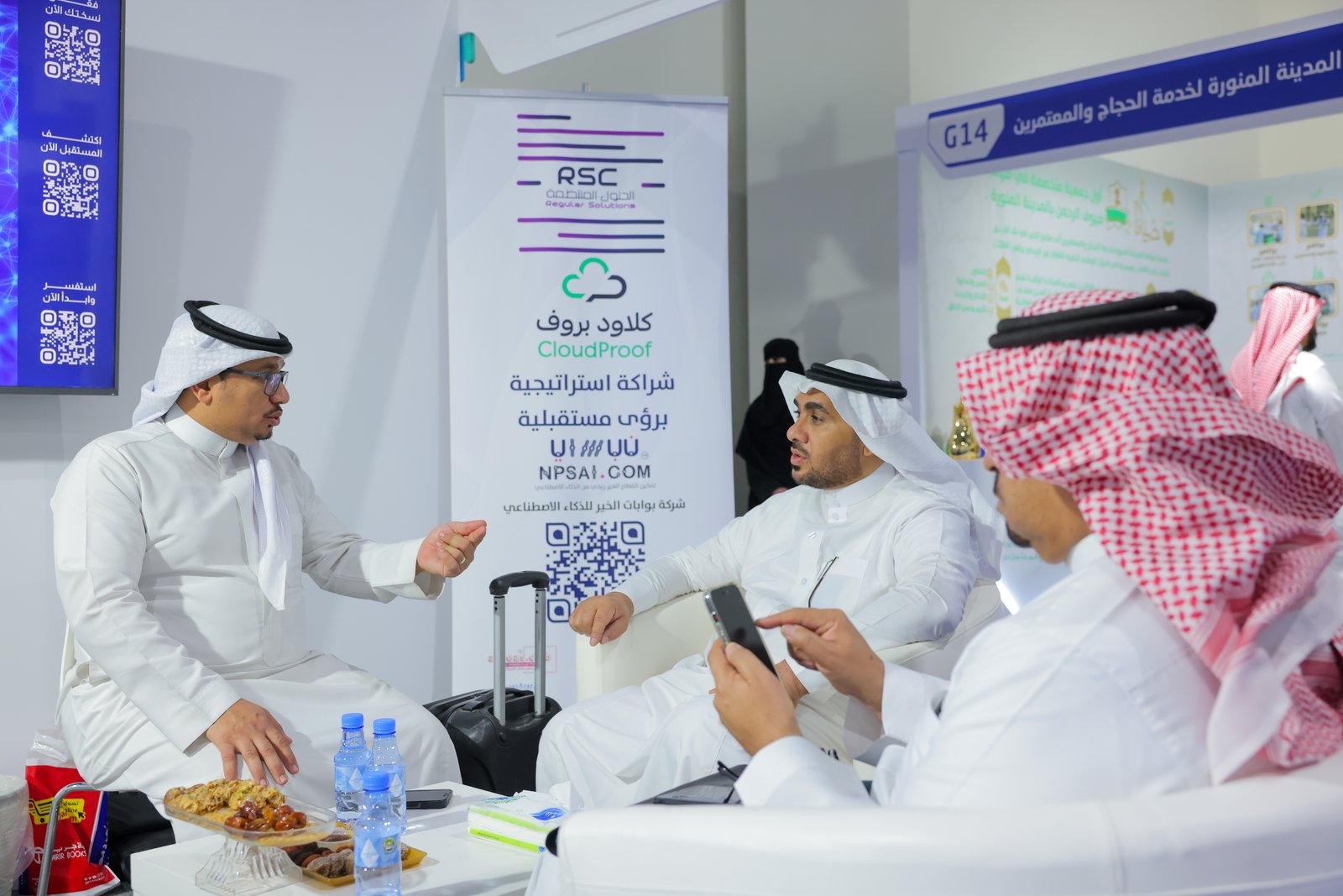 Low angle view up into a sky filled with deep blue clouds. 