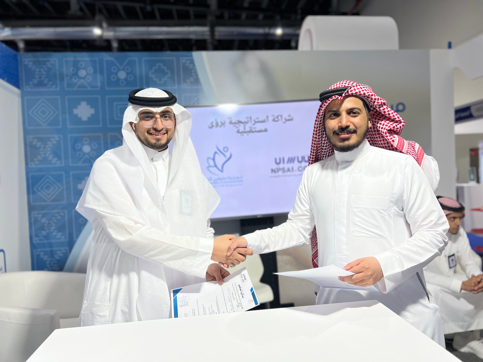 Low angle view up into a sky filled with deep blue clouds. 