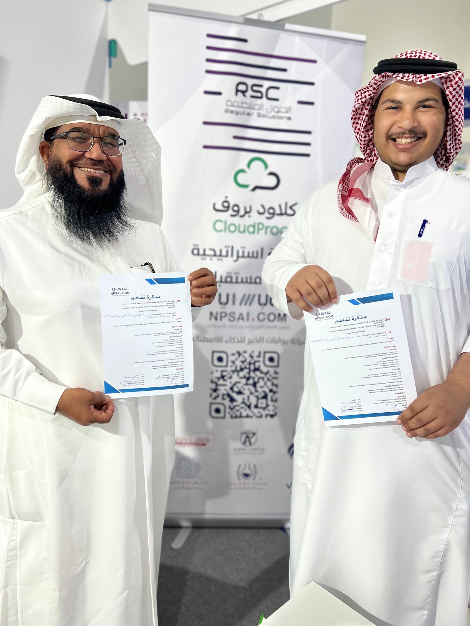 Low angle view up into a sky filled with deep blue clouds. 