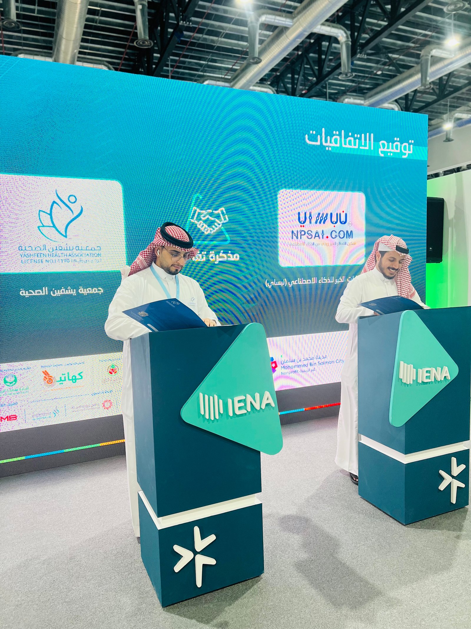 Low angle view up into a sky filled with deep blue clouds. 