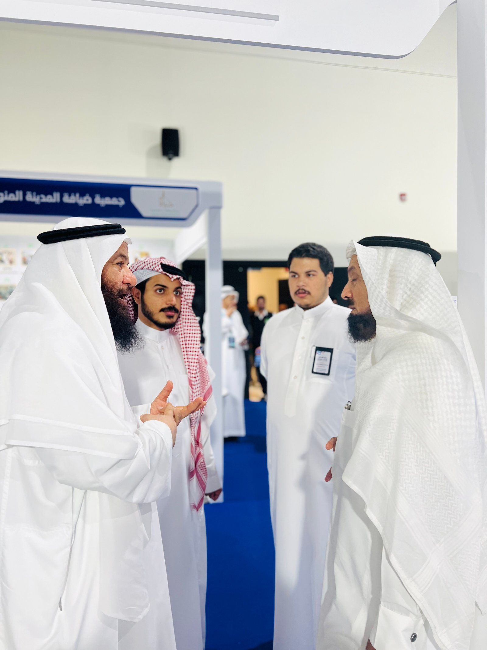 Low angle view up into a sky filled with deep blue clouds. 